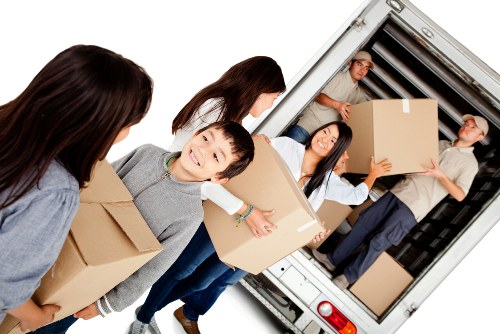Removal team planning a local move in Ratcliff with boxes and furniture