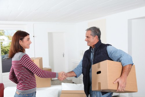 Furniture and boxes being transported by a local moving service