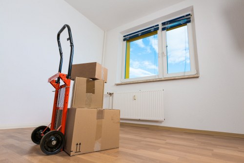 Commercial removal crew handling office furniture and equipment locally